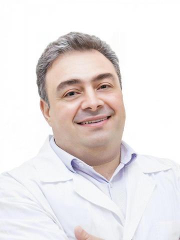 Имплантолог Хачатуров Эрнест Георгиевич
