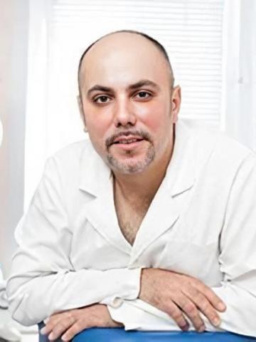 Ортодонт Гетигежев Игорь Олегович