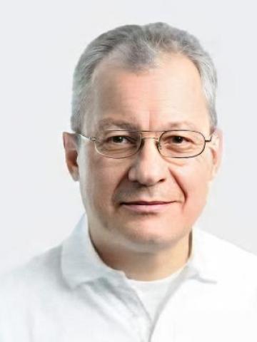 Имплантолог Скухторов Владимир Вячеславович