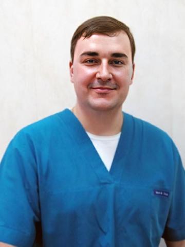 Хирург Худайбеогенов Геннадий Геннадьевич