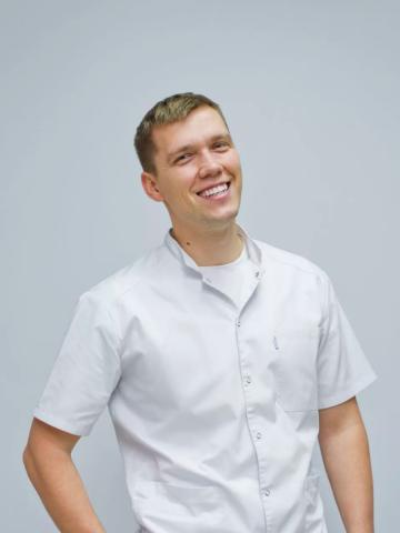 Имплантолог Поплевченков Андрей Николаевич